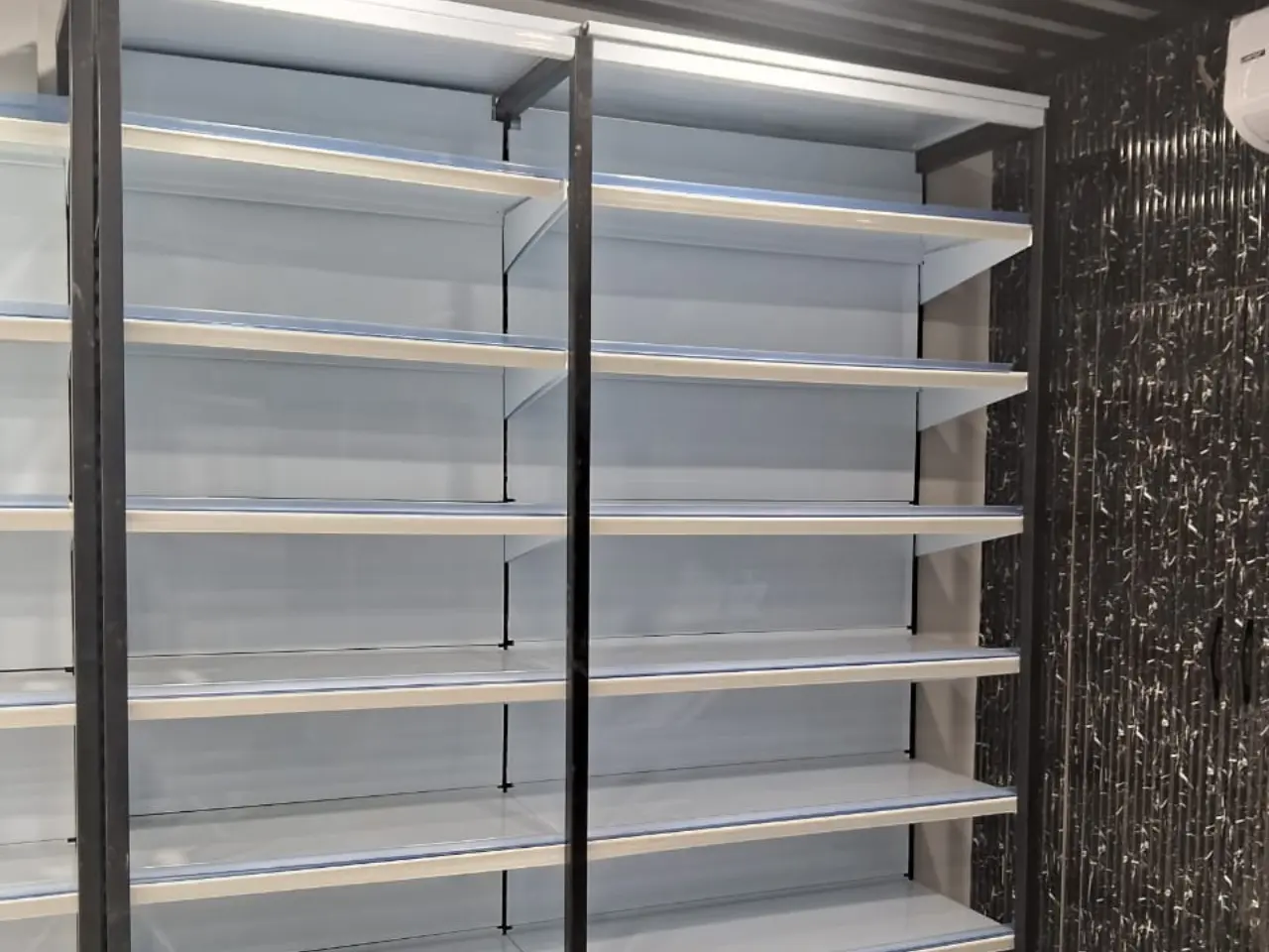 832878679_Modern display racks installation .webp